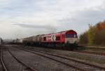 266 072 der HGK zusehen mit einem Kesselzug am 25.10.13 in Neu Ulm.