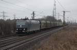 185 547 (MRCE,PRESS) mit Holzhackschnitelzug am 07.03.2009 durch Ahlten -> Misburg