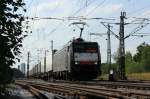 ES 64 F4 038 der MRCE zieht am 21.06.12 einen KLV Zug fhr TXLogsitik durch den Rangierbahnhof Mnchen Sd.
