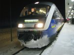 VT Desiro  der Mrkischen Regiobahn (OLA) am Bahnsteig von Jterbog vom harten Betriebseinsatz  im Winter gezeichnet gezeichnet .