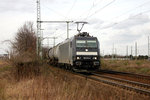 Rail4Chem 185 573 passiert mit Kesselwagen die unter Eisenbahnfotografen sehr beliebte Fotostelle in Köln-Wahn.
