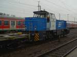 Die G1202 der Regentalbahn am 09.12.2007 bei der Durchfahrt mit einem Containerzug in Regensburg Hbf.