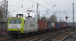 Captrain/ITL 145 095-6 mit Containerzug Richtung Frankfurt/Oder am 20.01.18 Berlin-Hirschgarten.