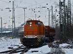 Locon 211 (293 502-1) mit einem leeren Schotterzug am 18.01.2013 bei der Ausfahrt in Aachen West mit dem Ziel Stolberg.