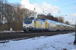 eine leicht vereiste ME 146 539-2 fährt als RB41 am 11.02.21 in den Bahnhof Scheeßel ein.