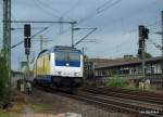 Die von der IGT gemietete 246 010-3 fhrt am 28.08.09 mit ihrem ME 39423 nach Cuxhaven an der S-Bahnstation Veddel-Ballinstadt vorbei Richtung Hamburg-Harburg.