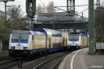 146 542-6 fuhr lz mit einen metronom durch hh-harburg,rechts der ME nach cuxhafen am 22.11.13