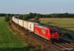 145-CL 013 MKB rollt im letzten Abendlicht des 26.07.12 mit einem Farbreinen Kistenzug aus Hamburg-Waltershof durch Ramelsloh Richtung Buchholz (Nordheide).