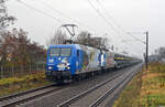 Zusammen mit 145 023 (145 083) führte 145 060 (145 103) der Press am 15.12.23 einen vollen ARS-Autozug durch Greppin Richtung Dessau.