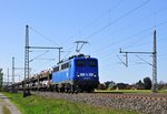 Die PRESS 140 007 (140 825, ex DB) transportiert am 21.04.16 einen Autotransportzug durch Dendensen-Gümmer in Richtung Hannover.