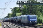 RBH Logistics GmbH, Gladbeck [D]  mit der  145 008-9  [NVR-Nummer: 91 80 6145 008-9 D-DB] und einem Kesselwagenzug am 05.06.23 Vorbeifahrt Bahnhof Dendensen-Gümmer.