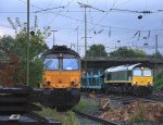 Die Class 66 V266/PB10 von der Rurtalbahn-Cargo kommt mit einem Fiat-Autoleerzug aus Antwerpen(B) nach Tychy (PL) und fhrt in Aachen-West ein in der Abendstimmung am 27.9.2012.