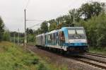 Am 22.September 2013 war RP 185 672 mit GA RTB/Railmagazin 186 110 als Tfzf bei Marienborn auf dem Weg Richtung Westen.