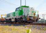   Die an die SLG Spitzke Logistik GmbH vermietete und der Vossloh Locomotives GmbH gehörende G 18 (92 80 4180 001-4 D-VL) im am 12.09.2015, mit einem  Langschienenzug, beim ICE-Bahnhof Montabaur