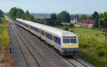 Ein RE von Chemnitz nach Leipzig, geschoben von einem Eurorunner der MRB, erreicht am 31.07.16 den Haltepunkt Belgershain.
