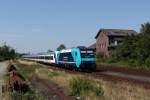 Die Zukunft auf der Marschbahn in grässlichem Design: 245 201-9 als NOB 81723 nach Hamburg-Altona kurz vor der Klappbrücke in Husum. Fotografiert am 03.08.2015. 