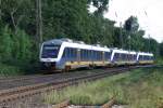 VT 648 444 der NordWestBahn und zwei weitere LINT 41 durchfahren am 28.08.2015 Ratingen Lintorf als RE 10 nach Kleve.