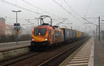 Der Feuer-Taurus der TX Logistik (182 572) schleppte am 02.02.19 einen KLV-Zug durch Bitterfeld Richtung Wittenberg.