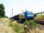 Die 185 518-8 der TXLogistik mit einem
Gterzug in Landsberg (bei Halle/Saale) am 03.07.08.