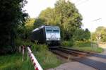 185 531-1 der TX Logistik kurz vor Passieren des Bahnbergangs in Neuoffingen, aus Donauwrth kommend. (KBS 995, 27.08.2008)