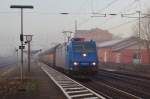 185 513 TXL mit ARS Altmann Autotransportwagenzug am 08.03.2014 in Bassum gen Bremen.