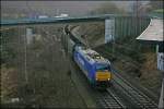 185-CL 003 fhrt mit einem leeren Kohlezug aus Elverlingsen Richtung Ruhrgebiet. (07.12.07)