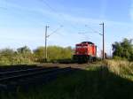 Ehemalige DR V60 der WFL kommt mit einem kurzen Containerzug durch Hamburg - Moorburg. Aufgenommen am 18.09.2009