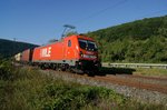 187 010 alias WLE 82 ist am 26.08.2016 mit dem Warsteiner-Bierzug auf dem Weg nach Mnchen und befindet sich etwa 2,5 Kilometer hinter Wernheim.