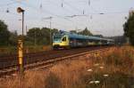 Hasbergen am 21.7.2014 um 6.34 Uhr: Einfahrt Westfalenbahn ET 019 aus Münster auf dem Weg nach Osnabrück.