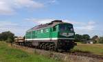 V300 004 (ehem. 232 429) der Wismut mit einem Leerzug Sand-Kippwagen vom Sanierungsgebiet nahe Ronneburg nach Kayna in Lumpzig-Hartha, 11.8.011. 