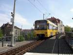 Stuttgart 2006 - Am neugestalteten Marienplatz in Stuttgart trifft am 23.04.2006 der Triebwagen 1001  Heslach  aus Degerloch ein.