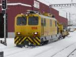 dienst--und-rangierloks RhB - Dienstfahrzeug Xmf 4/4 9918 im Bahnhofsareal Samedan am 04.12.2009