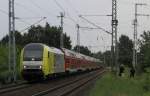 ER 20-007 kommt hier mit einem ILA-Shuttle durch die Berliner ...