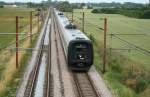 DSB Doppelgespann IR4 2028 und IC3 5082 auf dem Weg nach Fredericia am 29.6.2008 bei Ejby(Fyn).