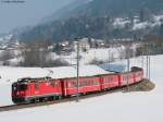 e-loks-ge-4-4-ii 629 der Rhb mit dem RE 1236 (Scuol-Tarasp-Disentis/Muster) bei Ilanz 14.2.10