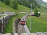 RE1248 mit Ge 4/4 II 613 Domat/Ems) zwischen Trun und ...