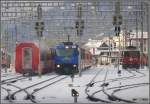 e-loks-ge-4-4-iii RE1120 mit Ge 4/4 III 652 'Vaz/Obervaz' f�hrt in Chur ein und wird gleich das Gleis des ausfahrenden RE1125 belegen. (29.01.2010)