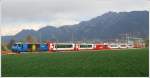 RE1153 vor dem Montalin bei Chur West. (21.04.2010)  ...
