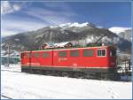 e-loks-ge-6-6-ii Ge 6/6 II 703 'St.Moritz' stellt sich in Untervaz-Trimmis vor dem Calandamassiv zur Schau. (01.02.2010)