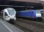ERB Eurobahn Ein Treffen des aktuellen Eurobahn Fuhrparks am 05.02.2010 in D�sseldorf Hbf. Links der Flirt auf der RE 3, rechts der zur Zeit eingesetzte Misch-Masch Zug mit 185 auf dem RE 13.