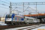 eu445370-183-husarztaurus 183 604 'Husarz' mit EC44 'Berlin-Warszawa-Express' durchf�hrt am 20.02.2010 den Haltepunkt Poznań G�rczyn 
