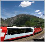 FO Furka-Oberalp-Bahn Den Aufstieg vor Augen
hat dieser Glacier-Express vor Andermatt. Gut die H�lfte des Berges im Hintergrund muss erklommen werden.
16. Juni 2008