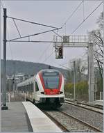 Der SBB RABe 522 210 unterwegs von Meroux nach Biel/Bienne verlässt den Bahnhof von Delle in Richtung Boncourt.