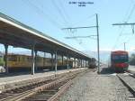 Alle 3 Spureiten auf einen Bild: Links die  Pyrenen-Metro  nach Villefranche (1,00 m), mitte der Nachzug nach Paris Austerlitz (1,44 m)und rechts Triebzug nach Barcelona (1,71 m) am 25.09.2003.