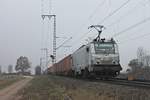 Außerplanmäßig fuhr am 21.12.2016 die AKIEM/CTD 37006 mit einem langen Containerzug bei Müllheim (Baden) über die KBS 703 in Richtung Schweiz.