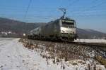 Akiem 37031 mit Kesselwagenzug in Fahrtrichtung Süden. Aufgenommen zwischen Mecklar und Ludwigsau-Friedlos am 22.01.2016.