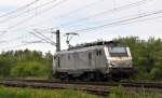 Akiem 37035, vermietet an HSL Logistik, befindet sich auf Leerfahrt in Fahrtrichtung Bremen am 11.05.15 in Diepholz (Nachschuss).