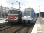 Hier links BB116054 und rechts 502 als TER47428 von Beauvais nach Paris Gare du Nord, diese beiden Triebfahrzeuge standen am 24.7.2010 in Paris Gare du Nord.