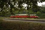 Der Train Touristique de l'Albret (TTA) mit jeweils einer Draisine vom Typ DU 65 als Zug- und Endfahrzeug unterwegs auf der seit dem 17.04.2004 befahrenen 13 km langen Strecke von Nrac nach Mzin an