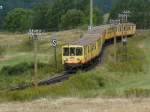 Der  Petit Train Jaune  der  Linge de Cerdange , eine wunderschne Bahnstrecke durch die Pyrenen, nhert sich Bolqure, mit 1593 Metern der hchste Bahnhof der SNCF.